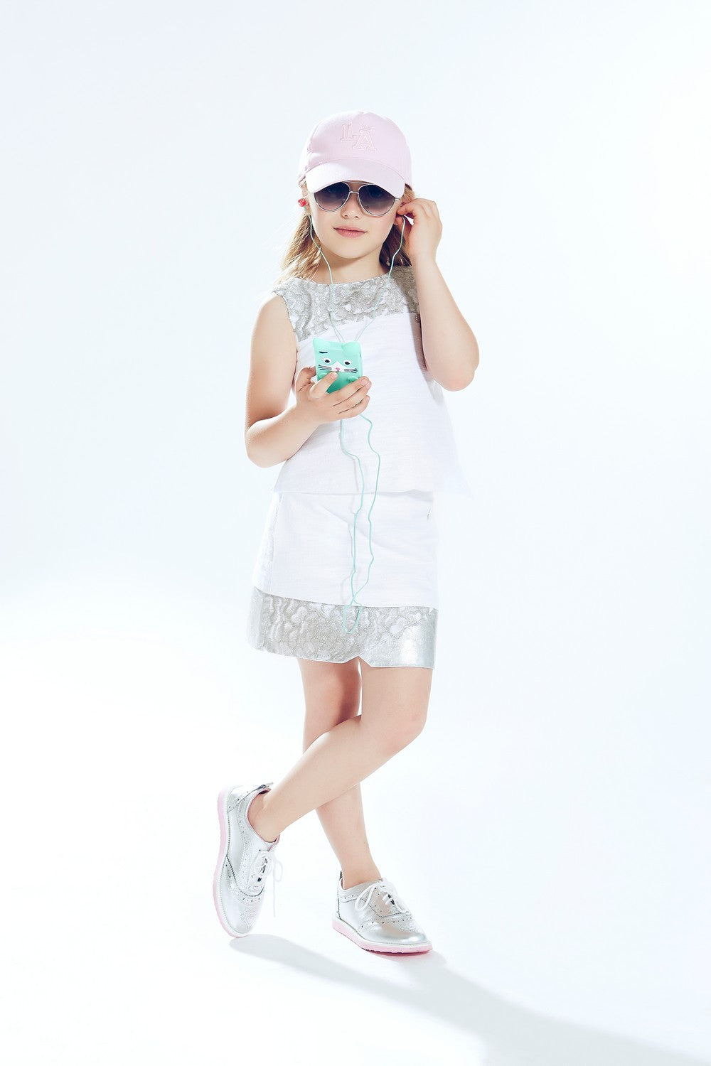 ValMax sleeveless top with asymmetrical hem