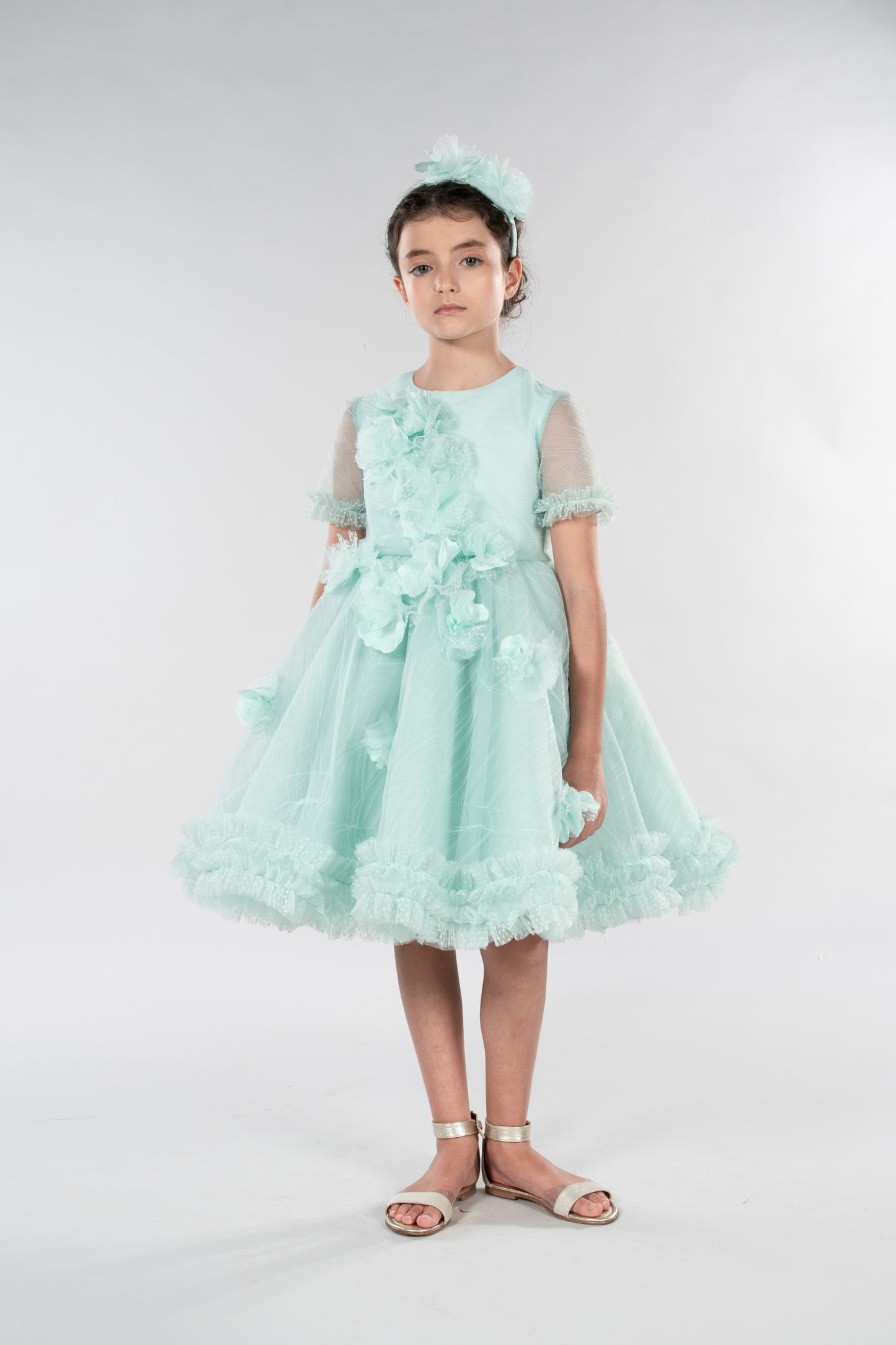 Abito in tulle plumetis plissato con fiori