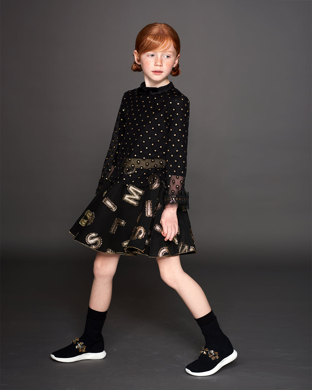 Top in tulle con decorazioni