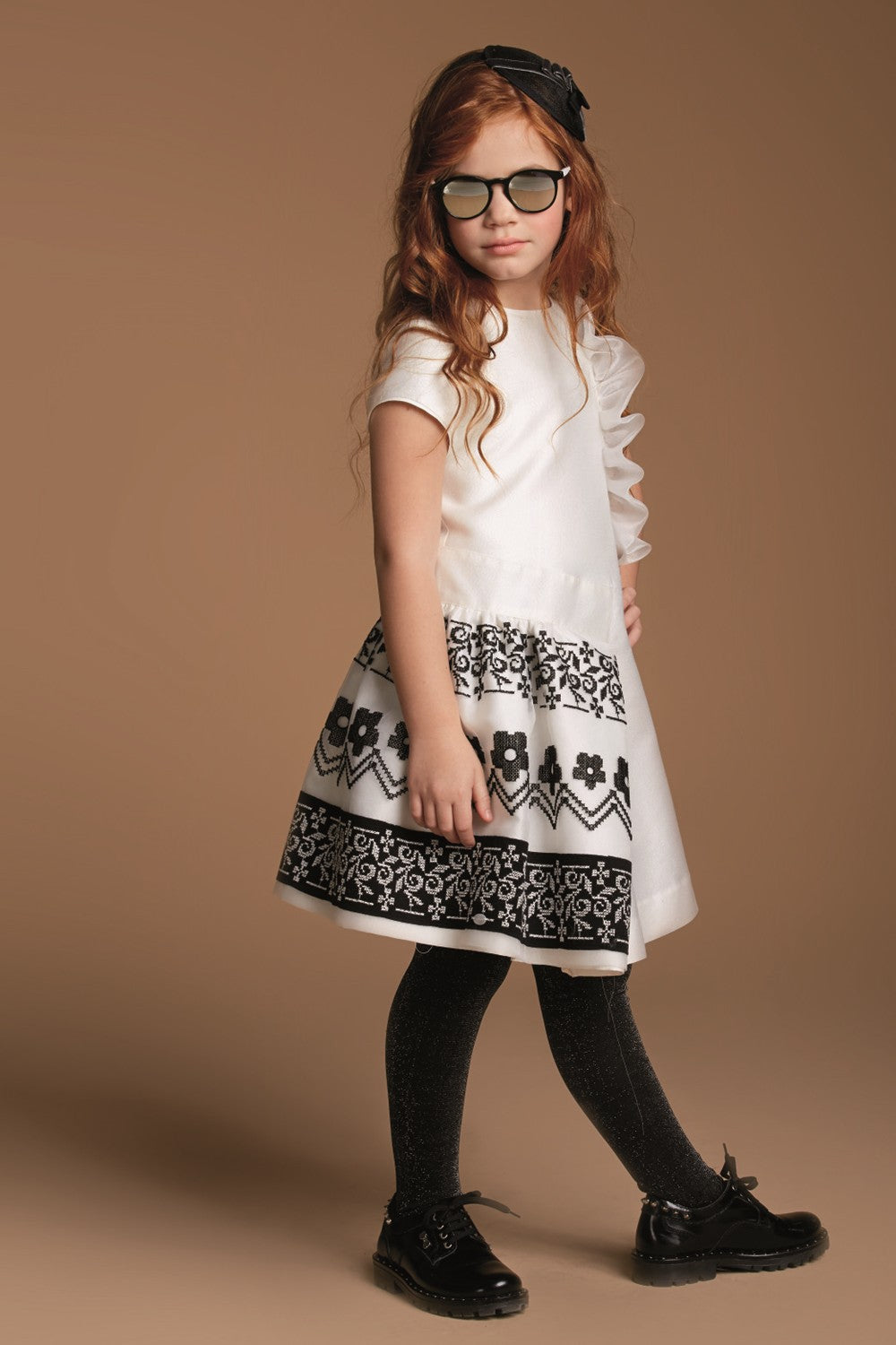ValMax dress with ruffles and cross-stitch embroidery