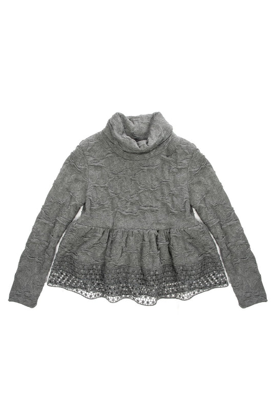 Maglia elegante con collo morbido e balza in pizzo